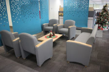 Reception room with Cordelle arm chairs and sofa